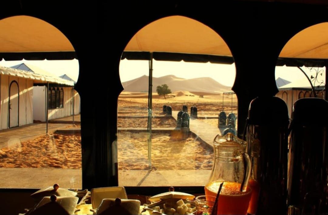 Traditional Moroccan mint tea prepared for guests at Grand Dune Luxury Camp in the Erg Chebbi desert